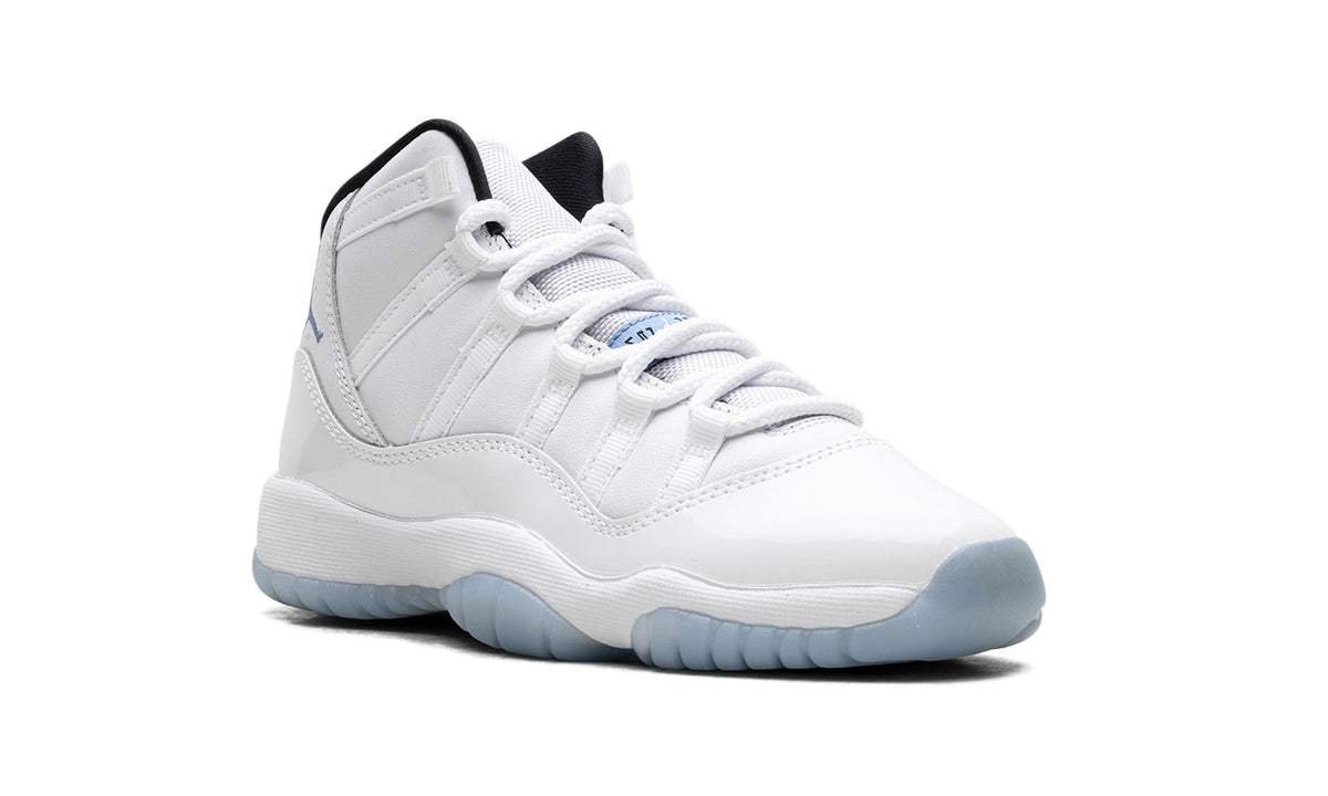 Air Jordan 11 Sneakers in White & Cream